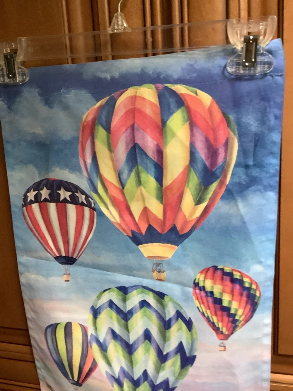 COLORFUL HOT AIR BALLOONS ON A GARDEN FLAG